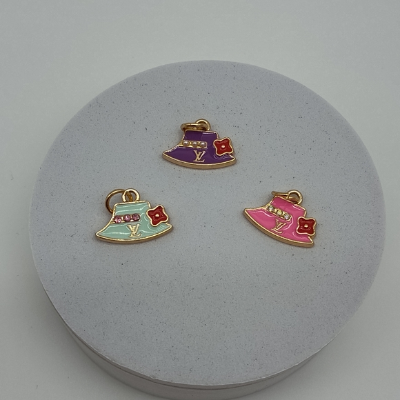 Louis Vuitton Jewelry - LOUIS VUITTON LV Hat Charm Trio Pearl Rhinestone Gold Tone Set Purple Teal Pink